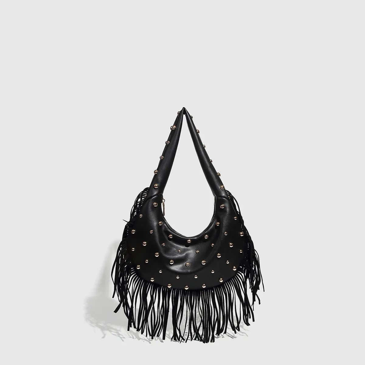 Retro tassel shoulder handbag in black or wine red showing integrated phone compartment and structured design
