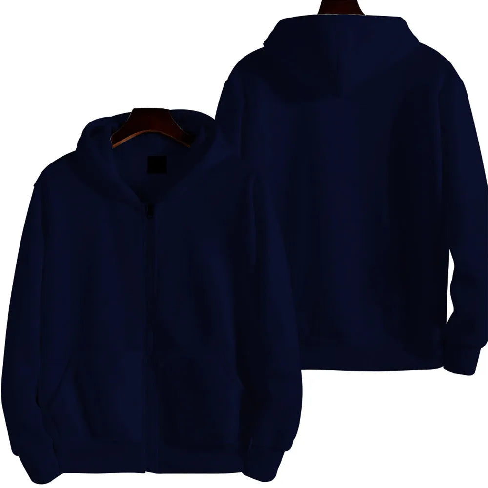 Man wearing a loose-fitting solid colour zip-up sports jacket in a cardigan style.
