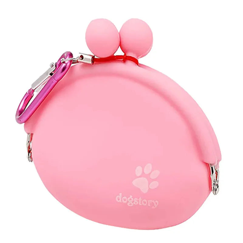 Yellow silicone pouch with hook-and-loop closure for dog treats, shown on a waistband.