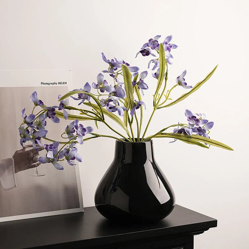 Modern black ceramic vase set with artificial white orchid flowers for home decoration