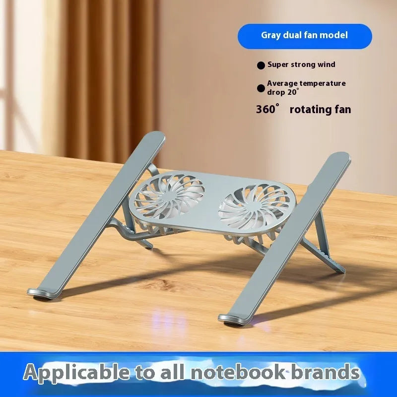 Silver aluminium laptop stand with twin cooling fans in a lifted position on a desk