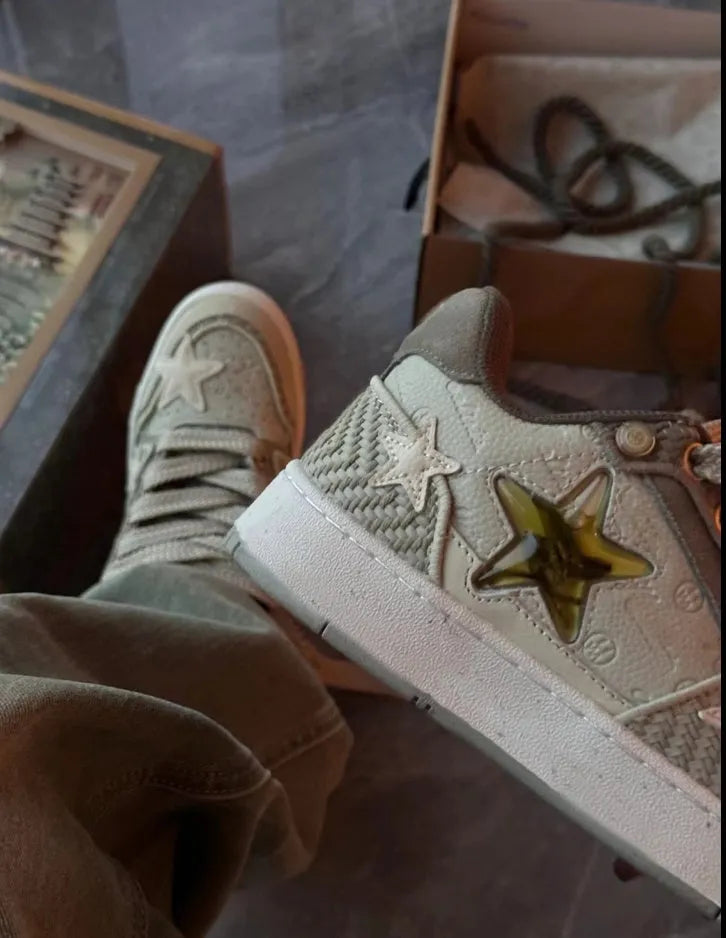 Green casual shoes with star pattern stitching, mesh lining, and thick rubber soles
