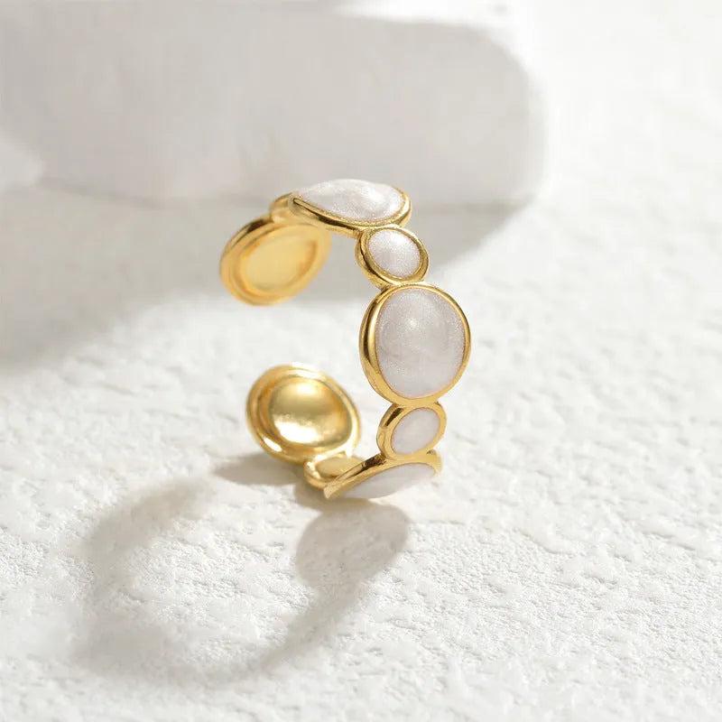 Adjustable opening geometric ring for women in stainless steel with electroplated finish