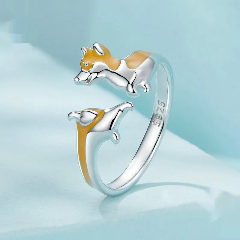 Silver ring with a raised cartoon corgi design in SCR1014-E electroplated colour.