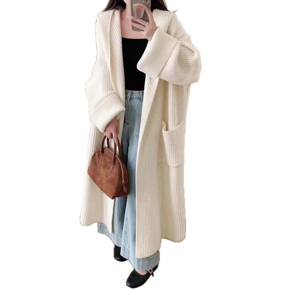 Women's loose hooded cardigan coat in beige with raglan sleeves and extended length