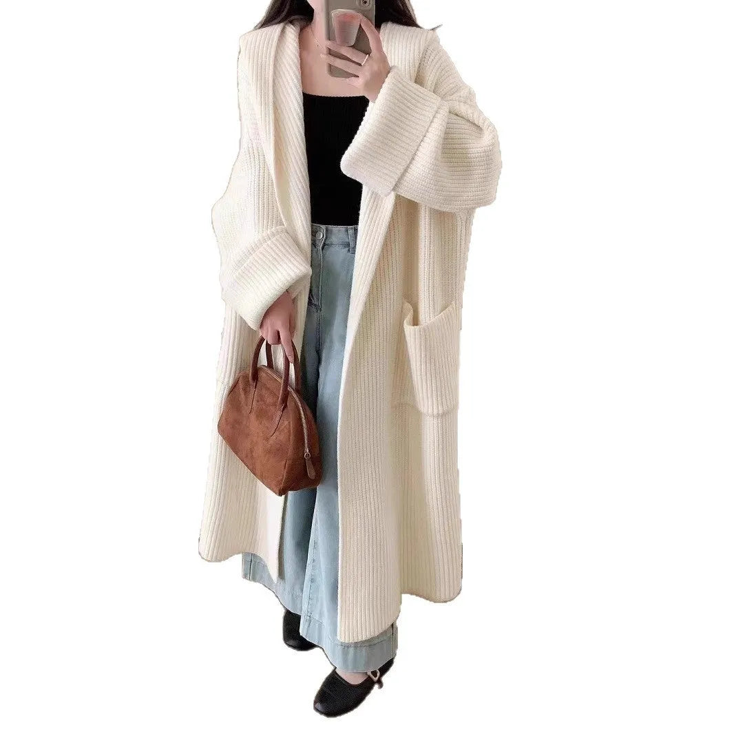 Women's loose hooded cardigan coat in beige with raglan sleeves and extended length