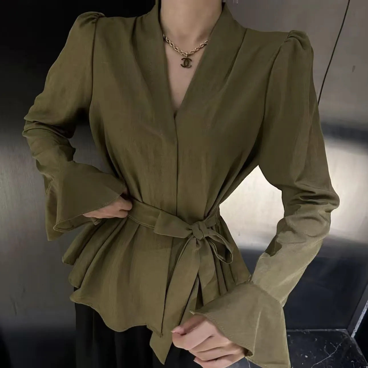 Women's French-style irregular collar long sleeve shirt with bell sleeves in a wine red colour.