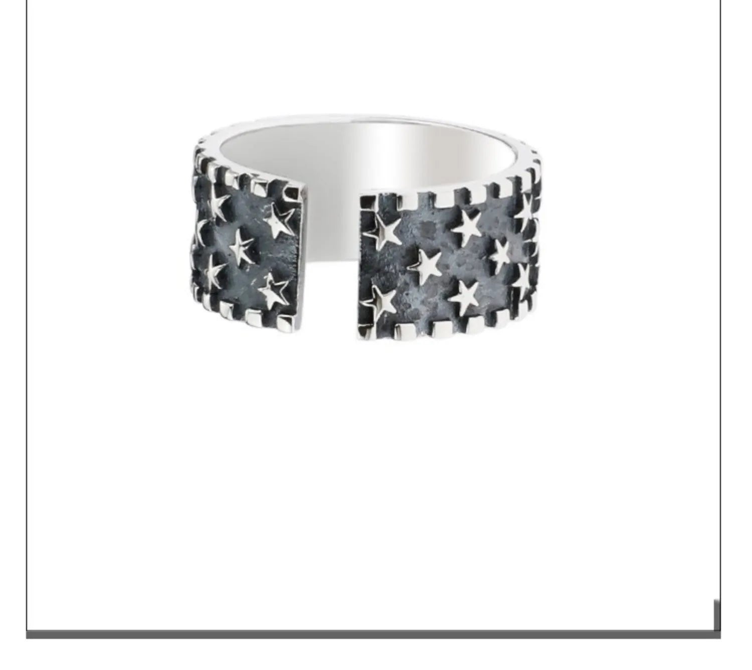 Adjustable silver ring with geometric five pointed star pattern on adjustable band