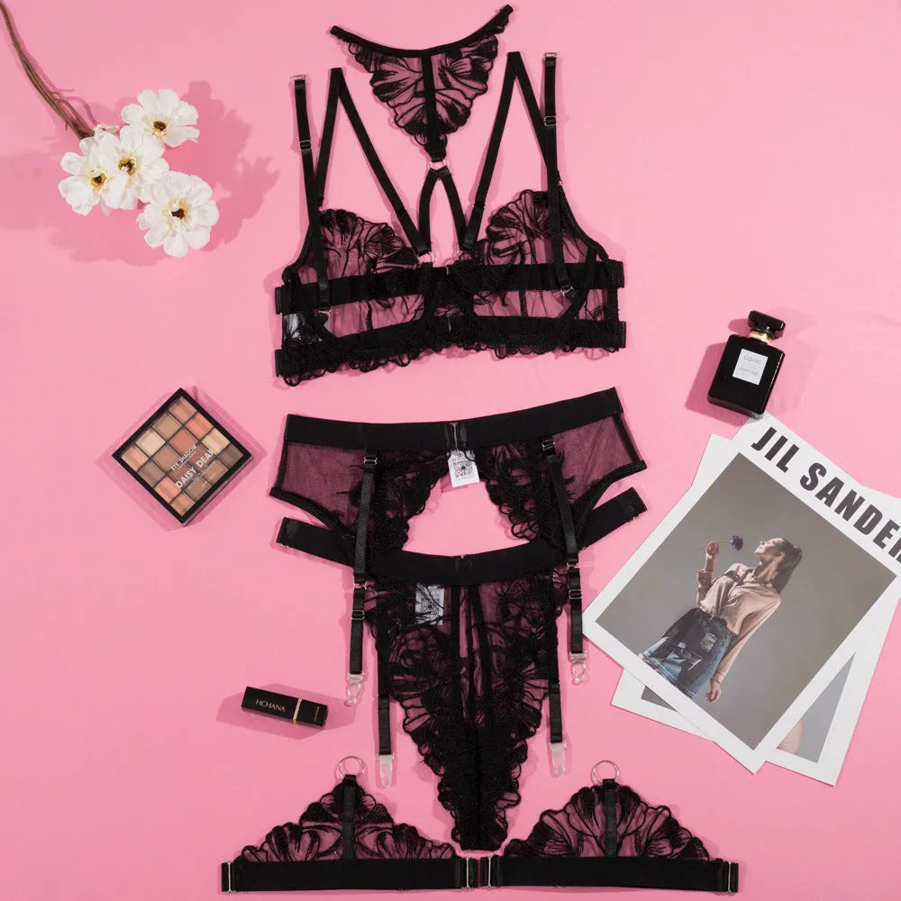 Black women's embroidered mesh bikini top with underwire support.
