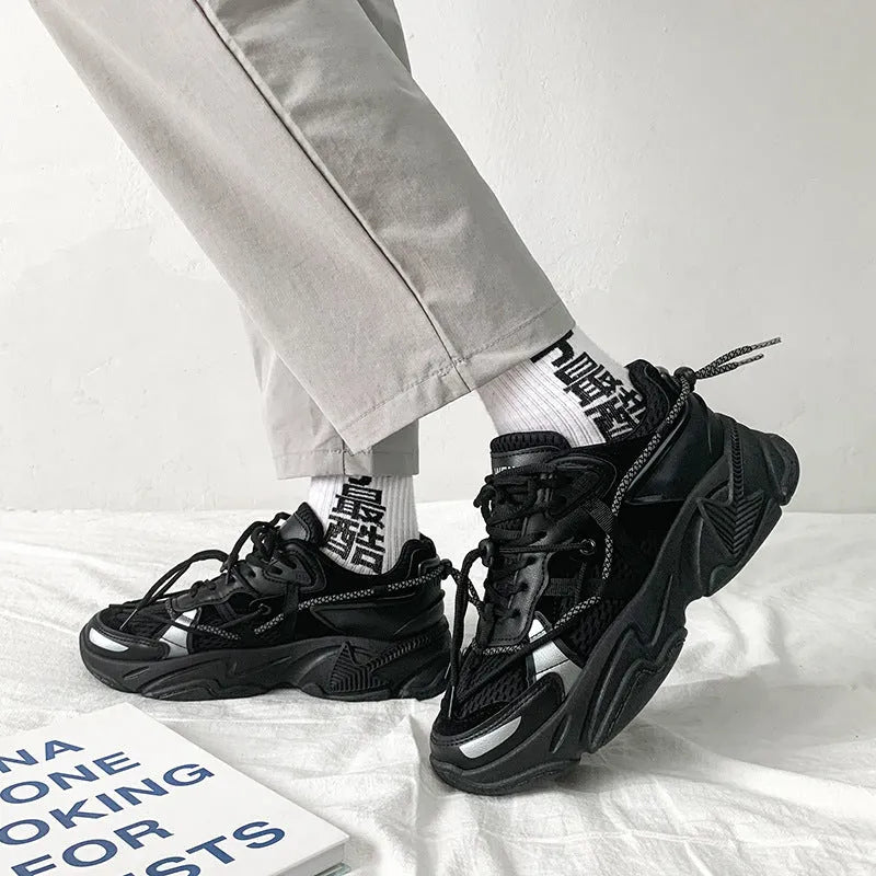 A pair of men's white Korean-style platform sports shoes with a lace-up front.