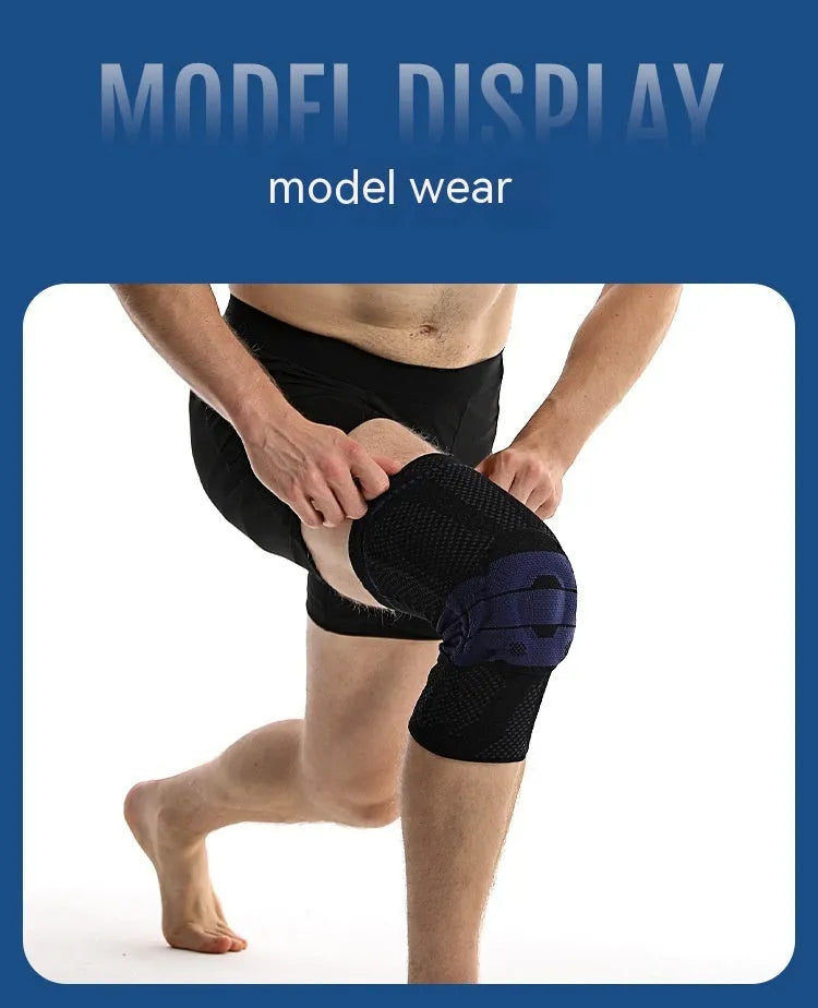Adult sports knee pads in black and blue colour, shown on a knee for size reference.