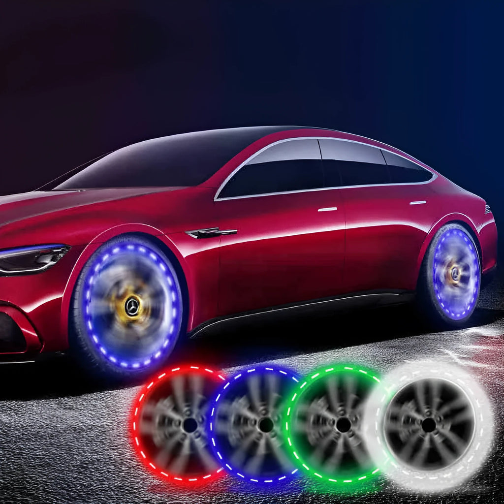 Colourful solar-powered LED valve flash lights mounted on a vehicle wheel hub.