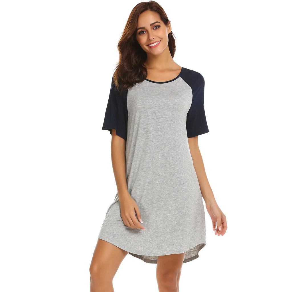 Women's double brushed nightdress with colour contrast patchwork sleeves on a hanger
