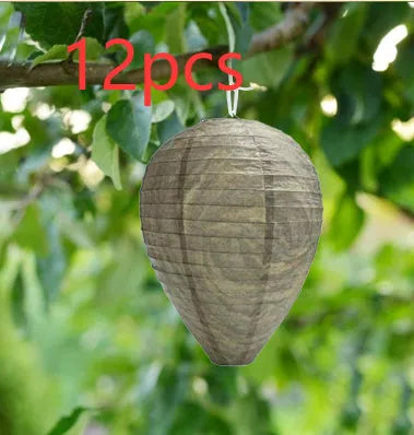 White paper beehive lantern with wire frame measuring 22cm by 28cm