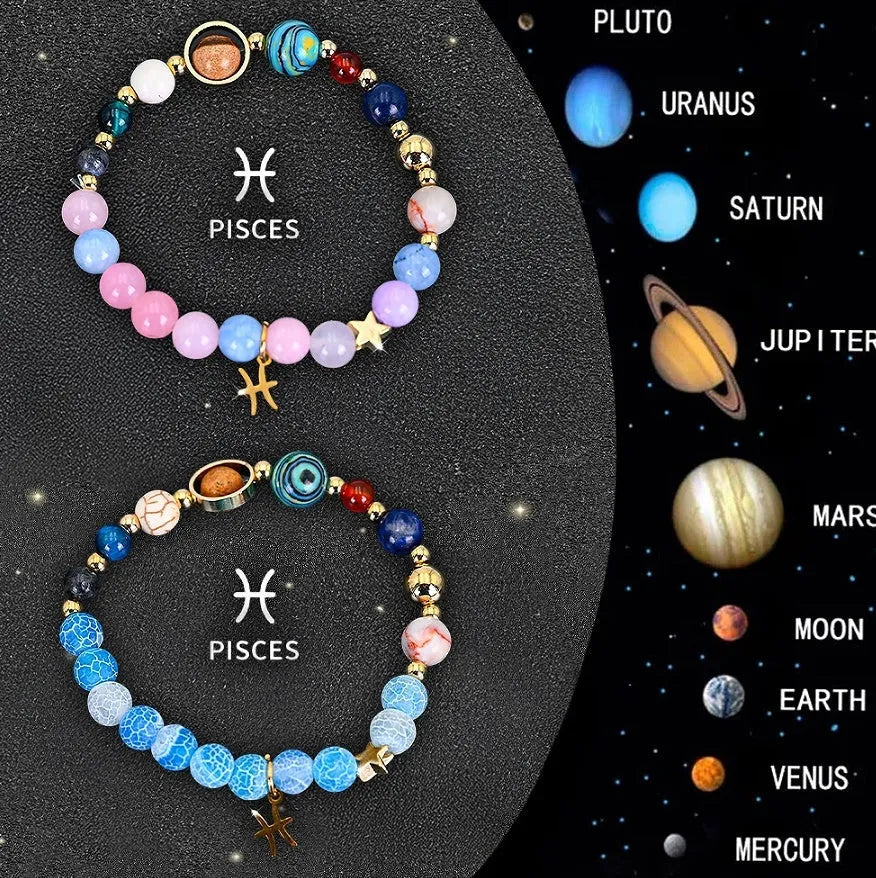 Set of two natural stone beaded bracelets with zodiac charms on a textured background.