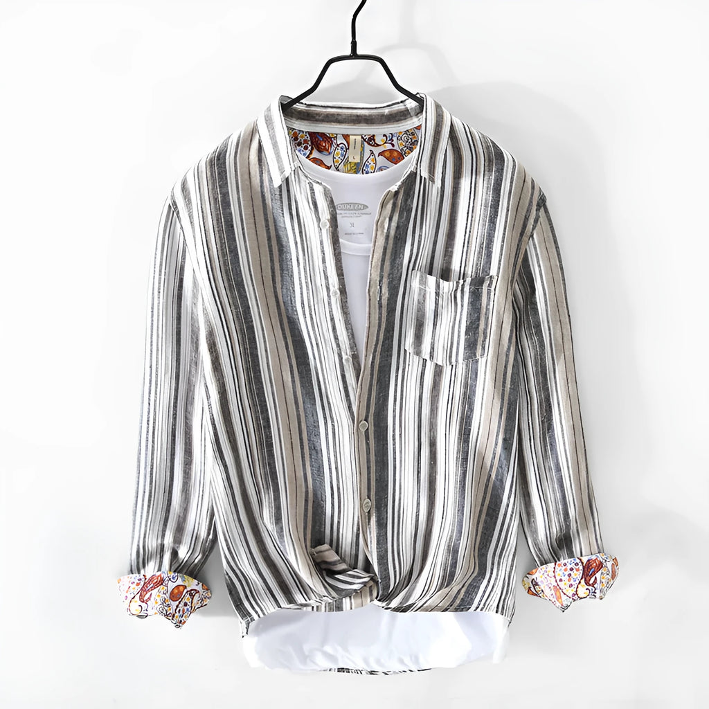 Red and grey striped linen shirt for men on a hanger, showing long sleeves and loose casual fit.