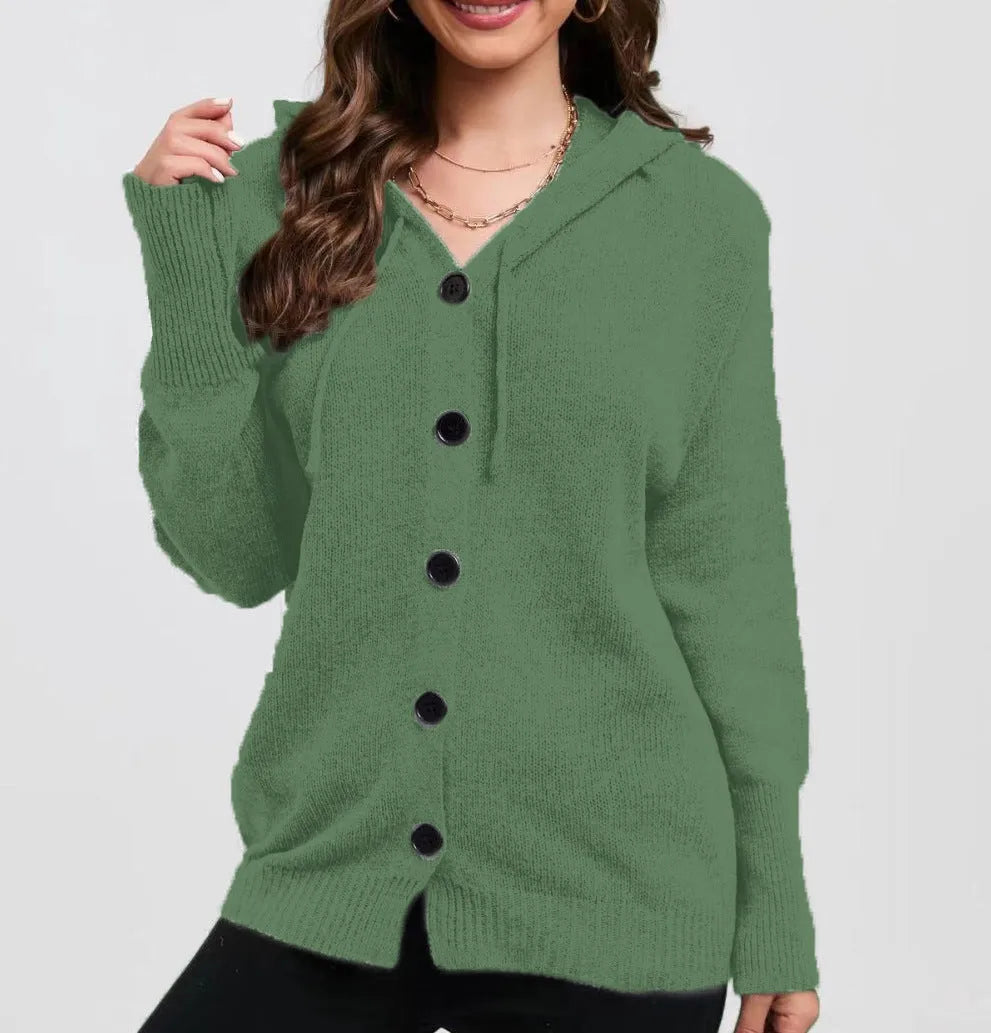 Women's solid colour loose-fit hooded cotton cardigan sweater on a hanger.