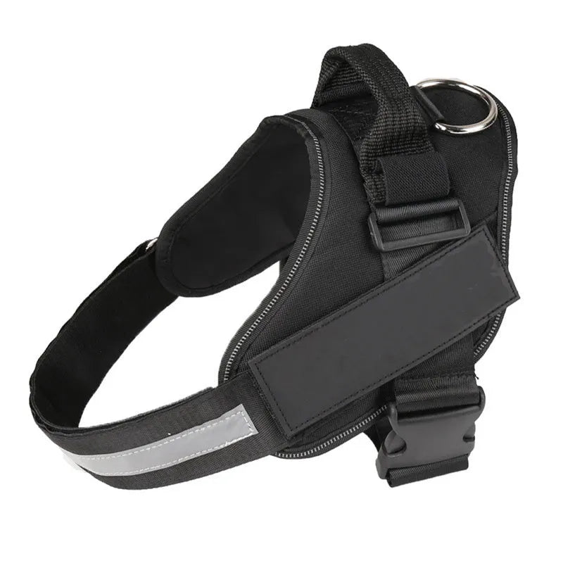 A reflective adjustable dog harness vest shown on a dog, with a handle and D-ring for leash attachment.
