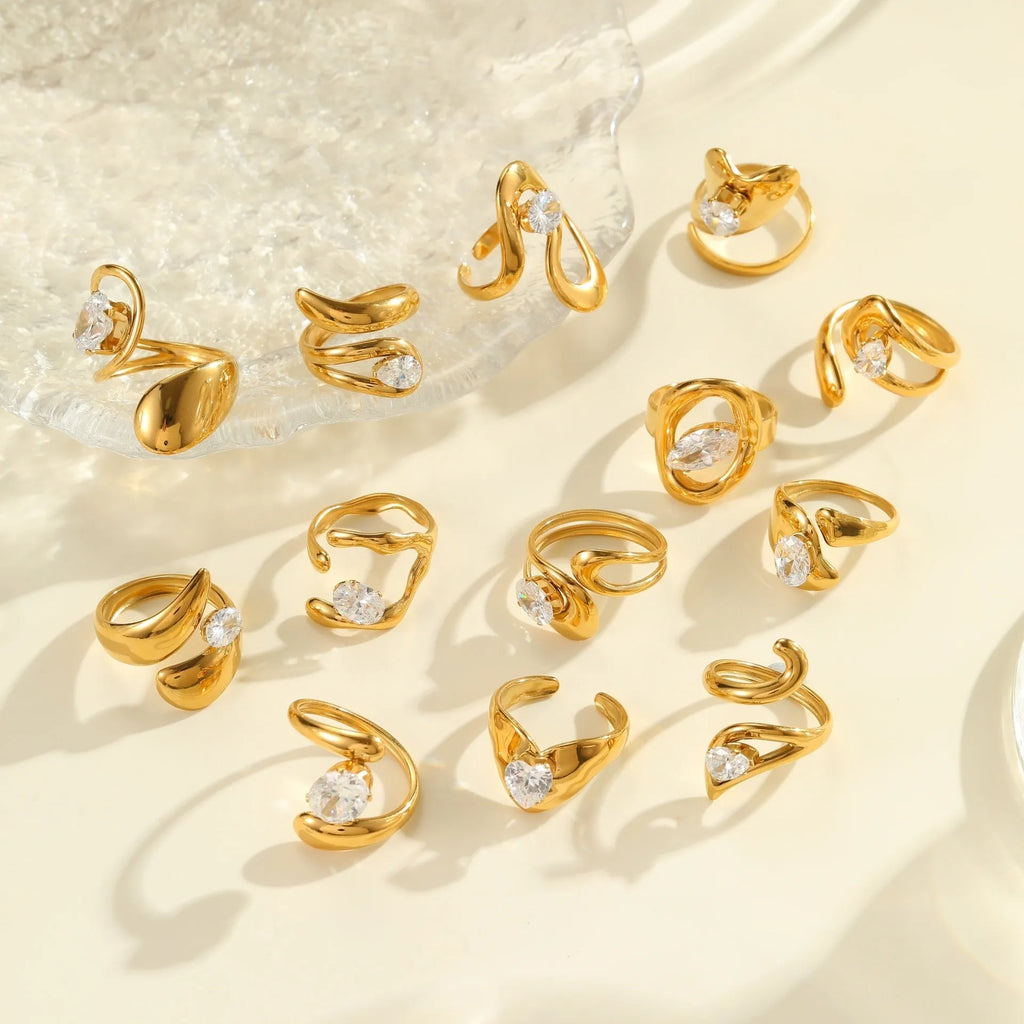Women's geometric zircon ring with adjustable open mouth design on a hand.