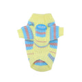 Blue and yellow striped wool dog sweater on small breed pet showing knit texture and casual style