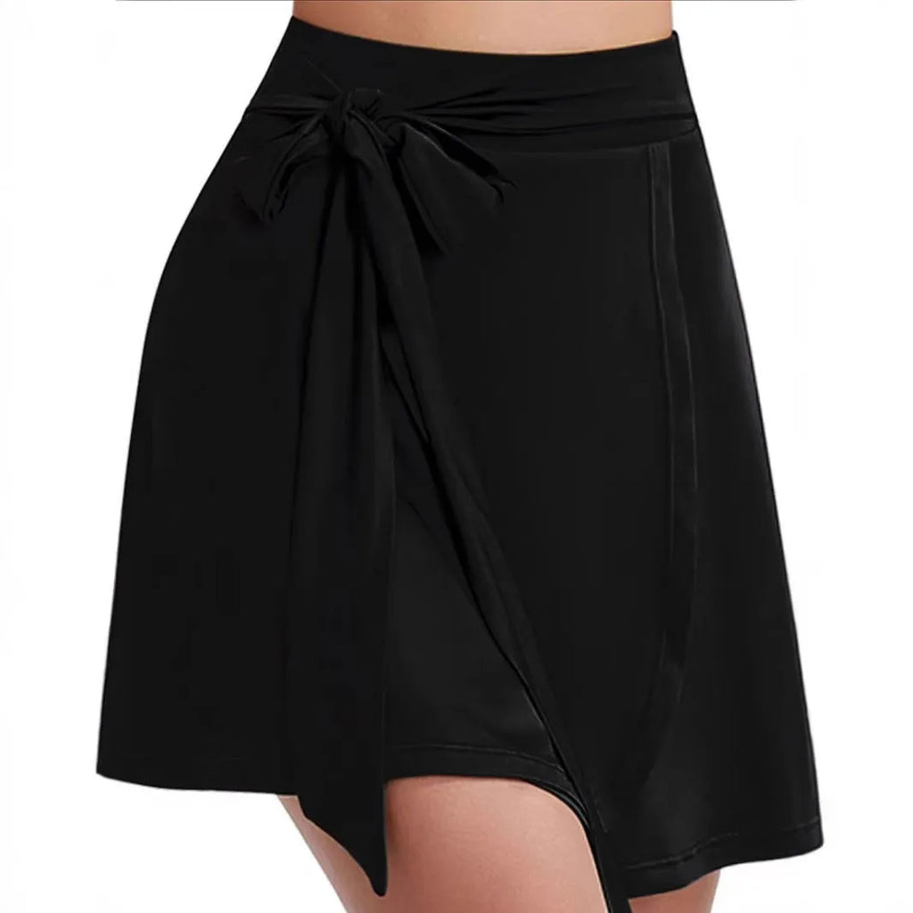 Black high-waisted sports culotte skirt with built-in shorts for anti-exposure coverage.