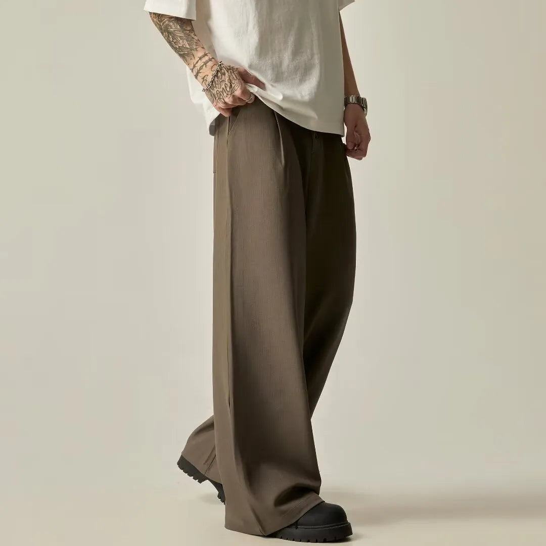 Men's black wide-leg casual trousers with vertical tube design and straight-leg styling