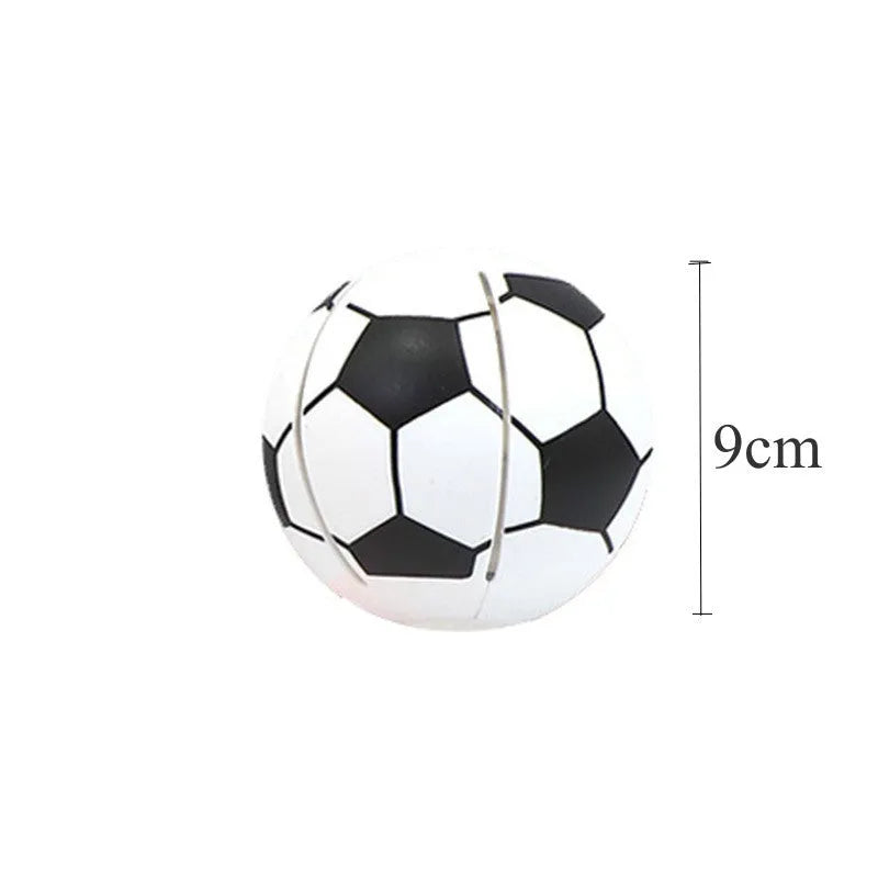 Interactive glowing dog toy ball that transforms to flying disc, shown in orange colour with 9cm diameter measurement