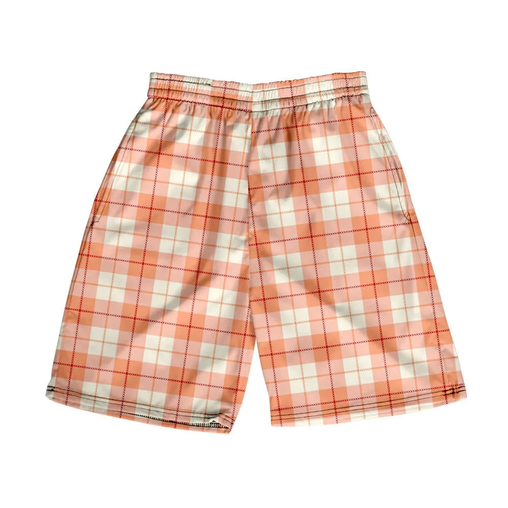 Man wearing plaid patterned polyester shorts with an elastic waistband, showcasing one of the twenty available colour options.