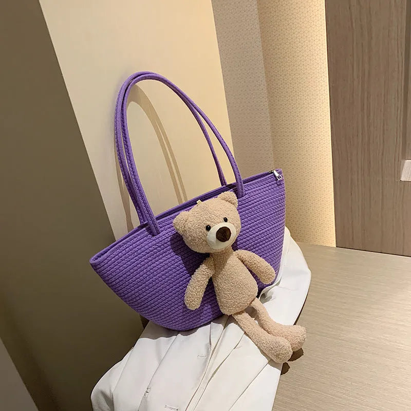 Cotton and linen woven bag with dumpling shape design and double shoulder straps in six colour options