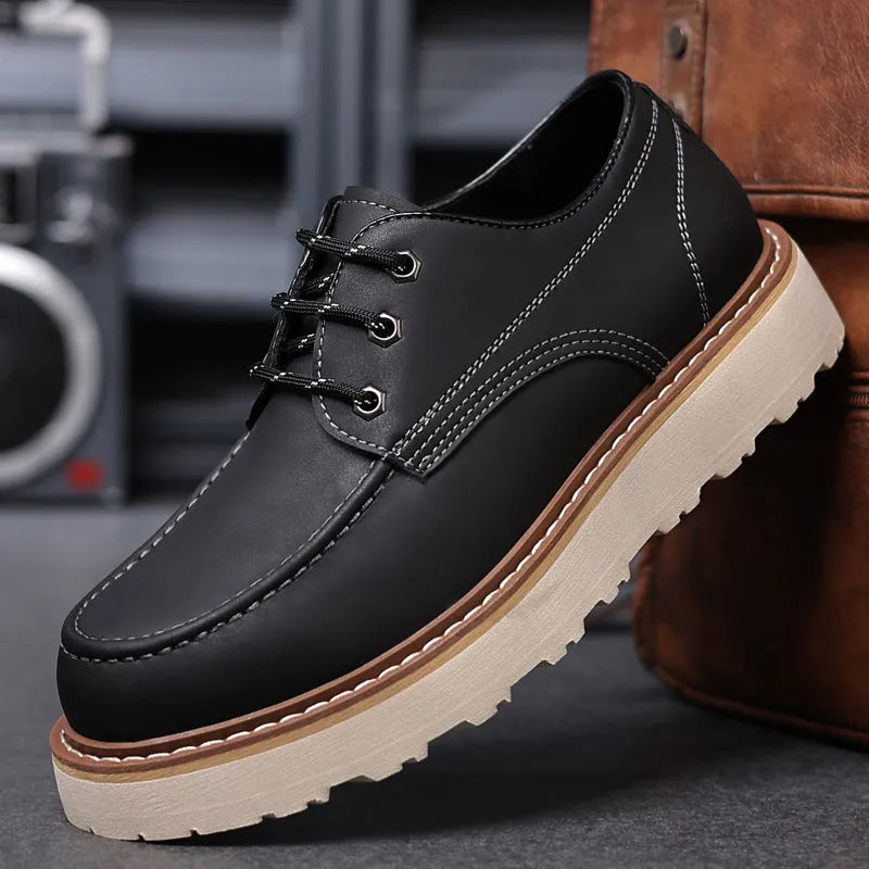 Men's black retro low-top Martin boots with a round toe and rubber sole.