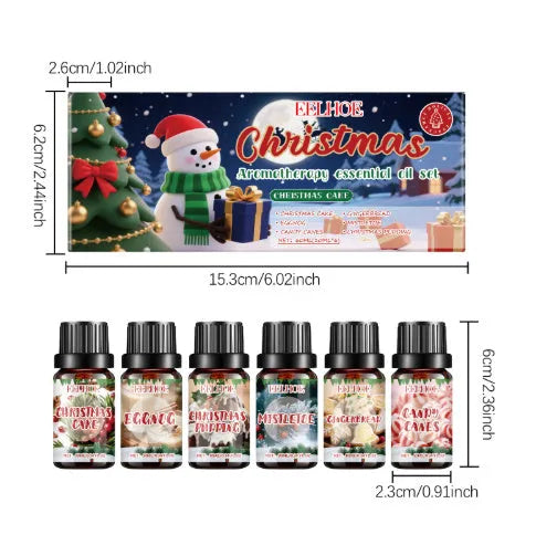 Christmas aromatherapy oil set showing 60ml bottle and six 10ml mini bottles with reed diffuser sticks
