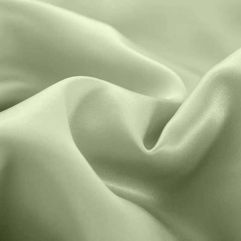 Double-sided silk duvet cover in solid colours with plain weave construction