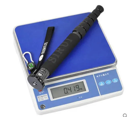 Black carbon fibre telescopic monopod for SLR cameras with six sections extended