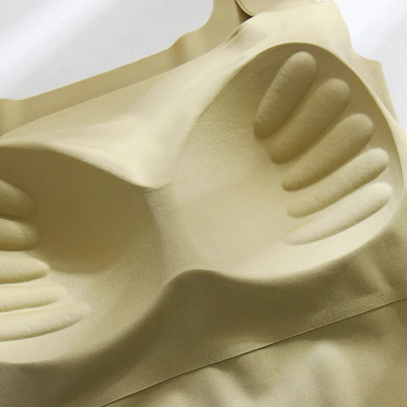 Women's non-marking nylon sling vest with chest pad in light blue, showing seamless beauty back design.