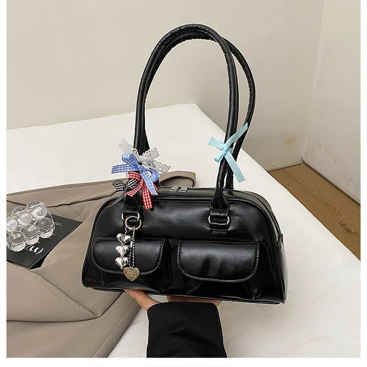 Retro women's pillow bag in PU leather with double shoulder straps and flap closure