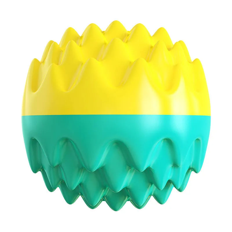 Blue and orange squeaky spiky rubber dog ball for aggressive chewers and dental health.
