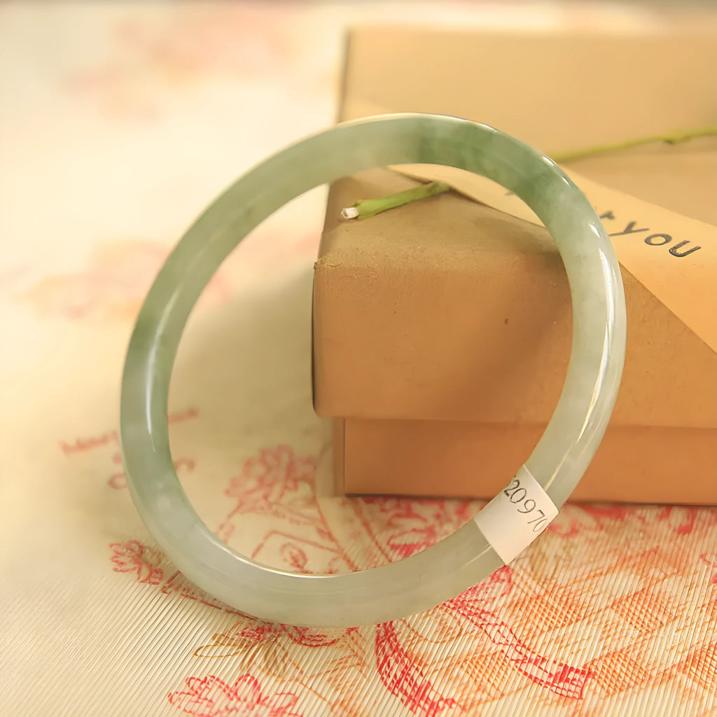 Green geometric jade waxy bracelet with manual craftsmanship and Chinese style design