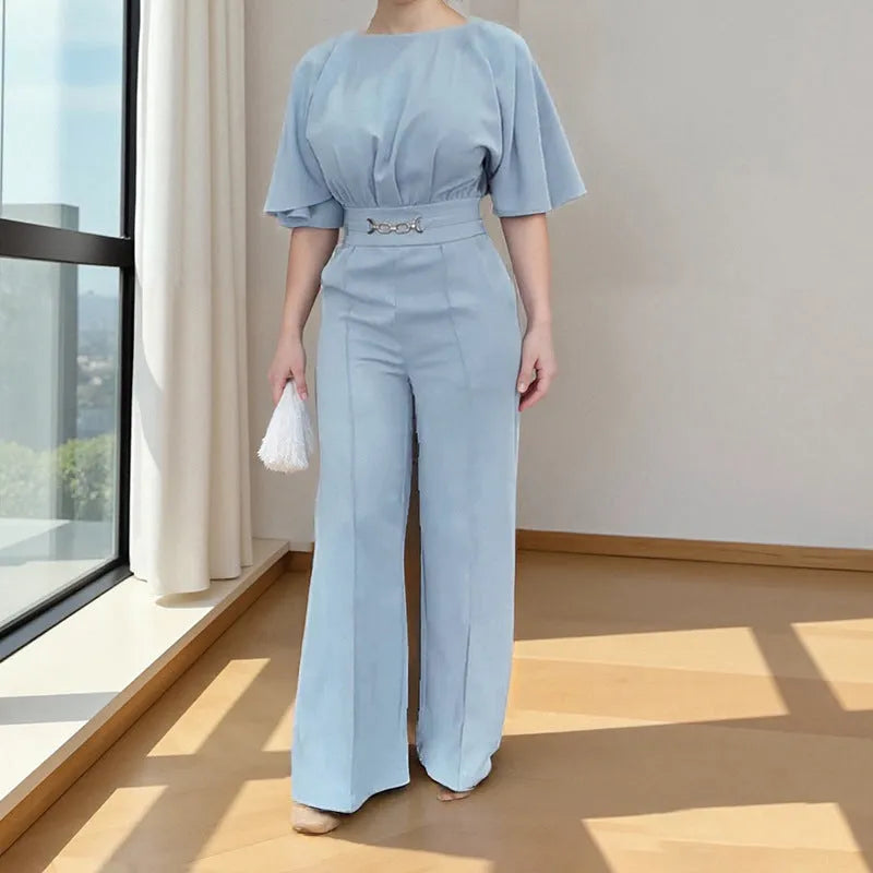 Blue men's casual polyester suit set with trousers and a long-sleeved shirt on a mannequin