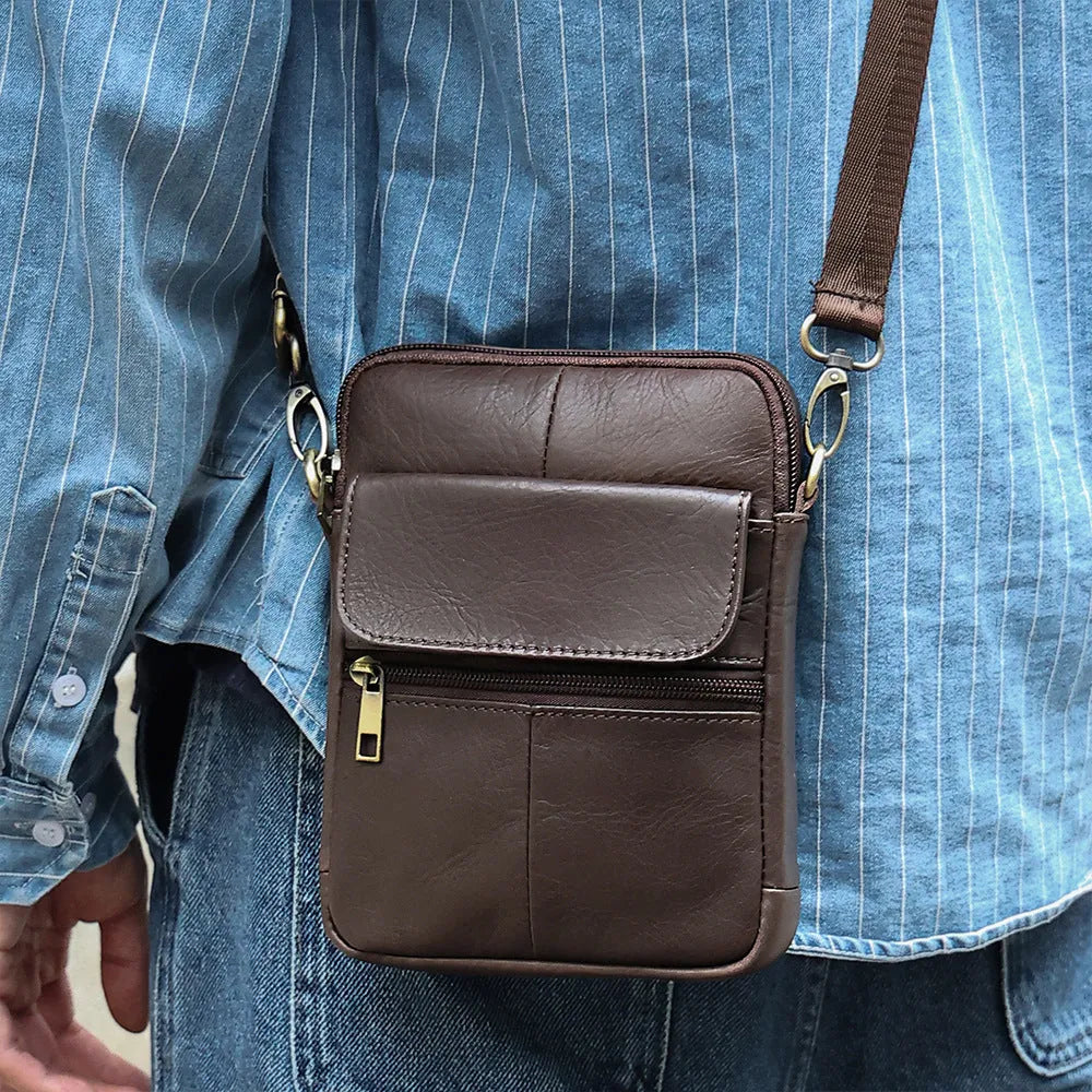 Men's brown genuine leather crossbody shoulder bag showing sewing line detailing