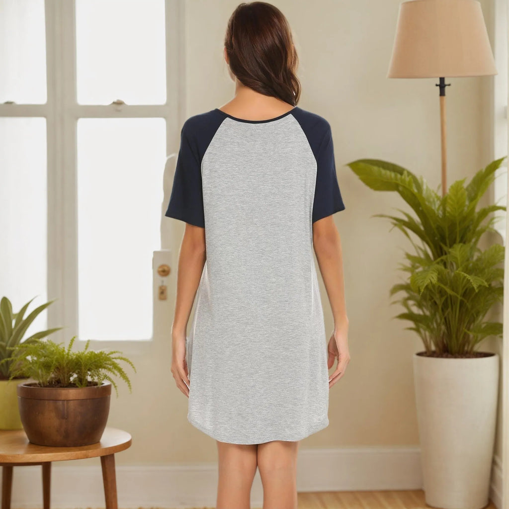 Women's double brushed nightdress with colour contrast patchwork sleeves on a hanger