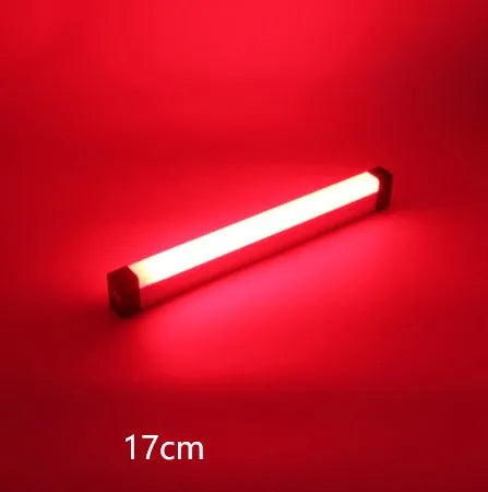 Blue and purple rechargeable LED tube night light with USB cable and dimmable switch.