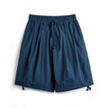 Men's Prussian blue nylon shorts with embroidered design and loose fit