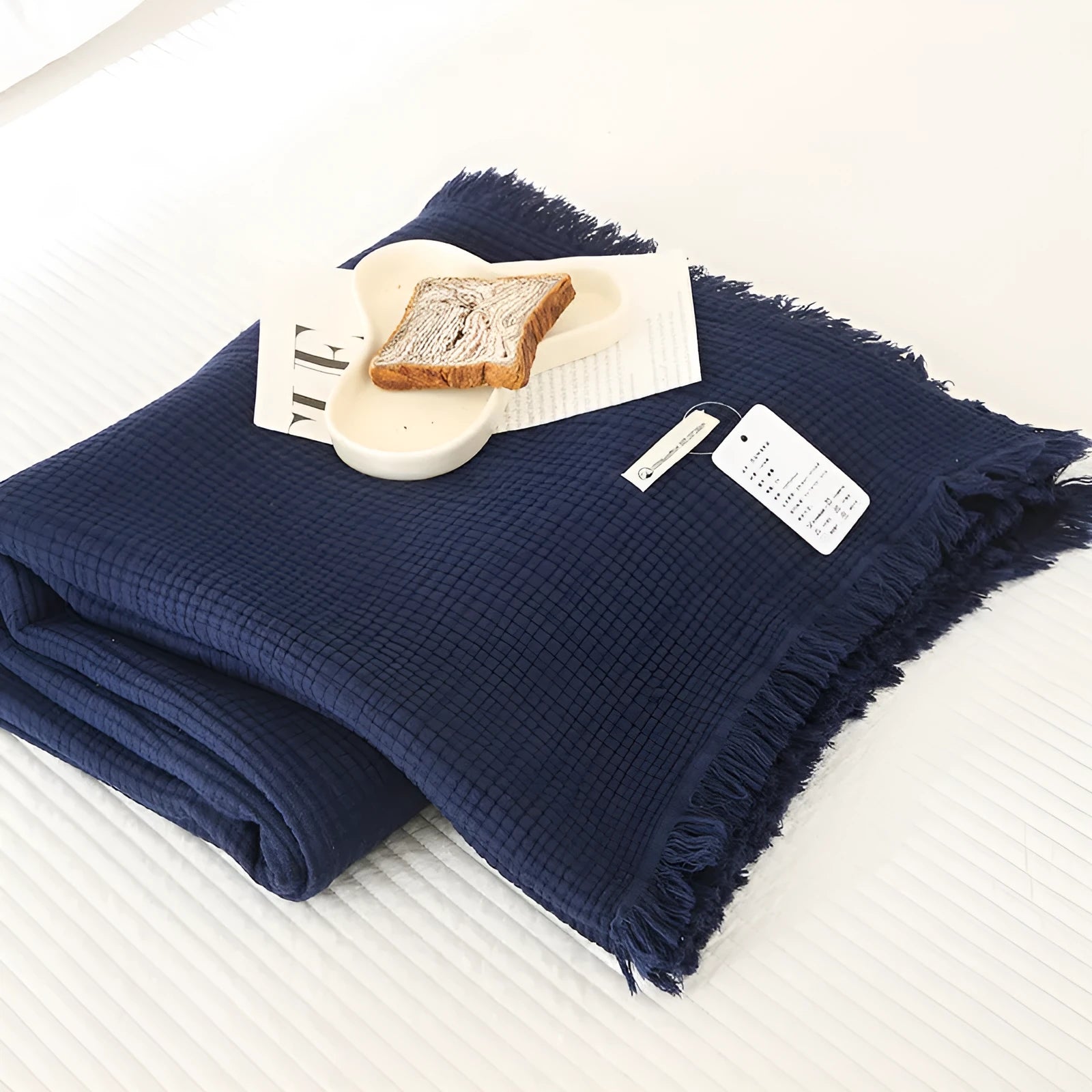 Four-layer gauze cotton blanket with tassel detailing in avocado green colour