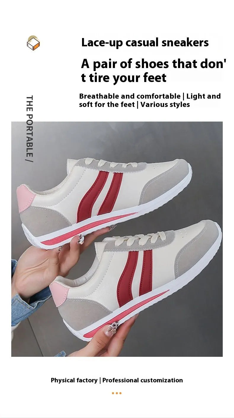 A pair of blue low-top lace-up running sneakers with a round toe and soft rubber sole on a white background.