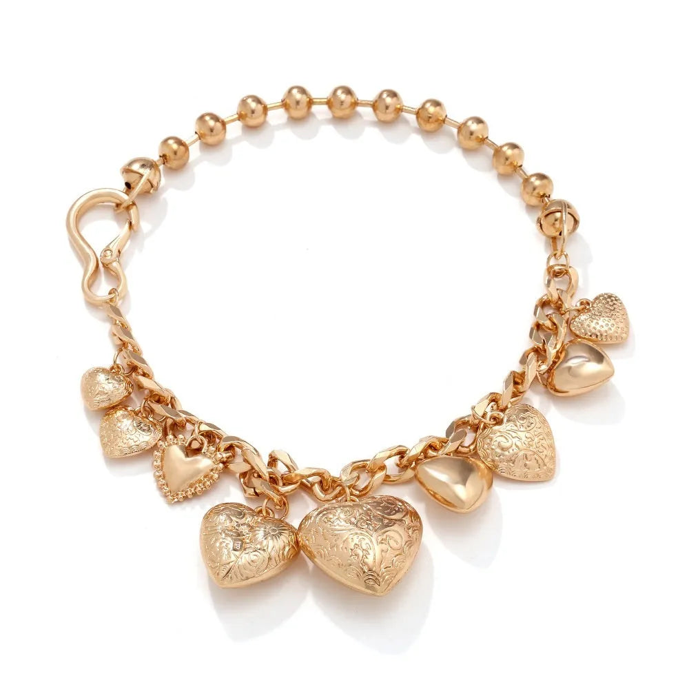 Exaggerated carved heart pendant necklace in gold or white K on an adjustable metal chain.