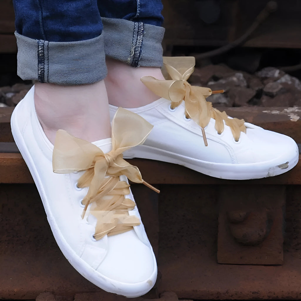Wide transparent lace shoelaces in multiple solid colours showing 4cm width and length.