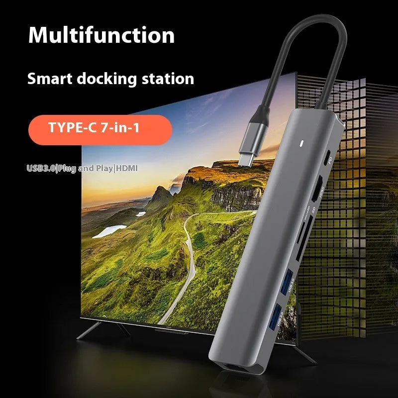 LQT-LH07 7-in-1 USB-C hub with HDMI port, USB-A ports, and SD/TF card reader slots for laptops.