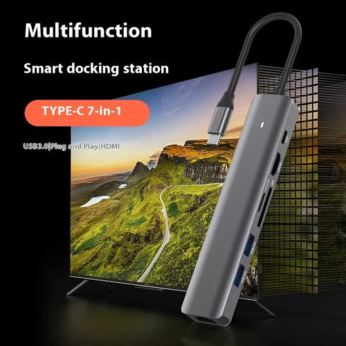 LQT-LH07 7-in-1 USB-C hub with HDMI port, USB-A ports, and SD/TF card reader slots for laptops.