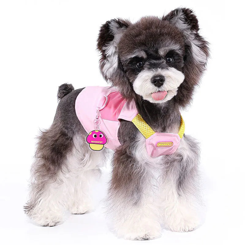 Pink lightweight polyester vest for small dog breeds on a white background.