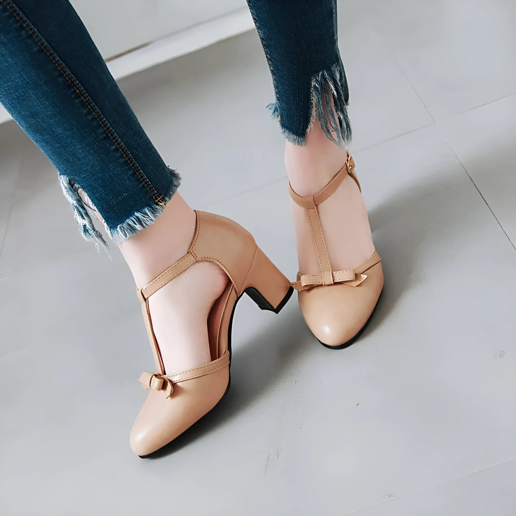 Women's apricot-coloured chunky heel sandals with a buckle strap and hollow-out round toe design.